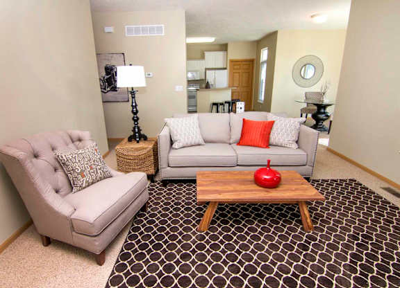 a living room with two couches and a coffee table