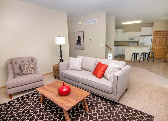 a living room with a couch and a table