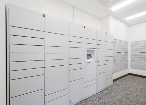 a row of white lockers in a white room