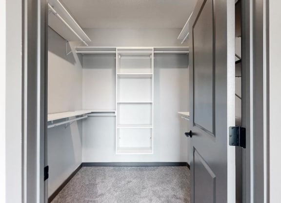 Large walk in closet that provides plenty of extra storage space for all of your belongings at Haven at Uptown in Lincoln, NE