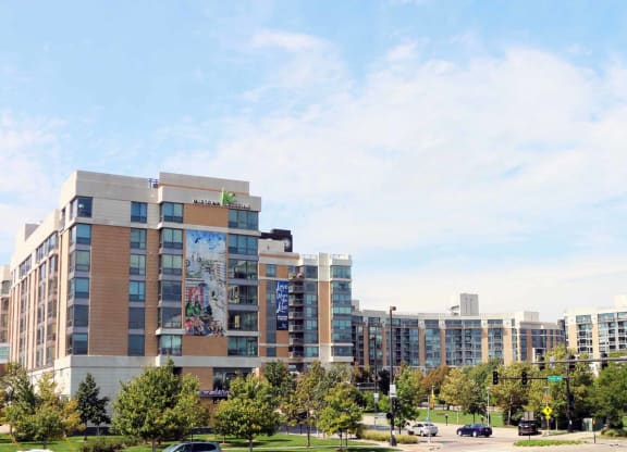 a view of a city with buildings and trees