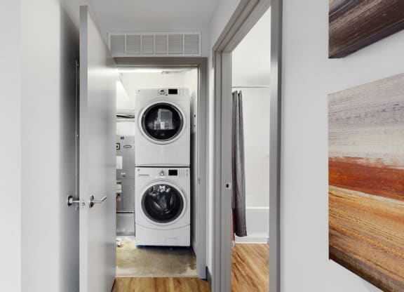 Full-size, front load, stacked washer and dryer is included in every floor plan at Midtown Crossing Apartments Omaha