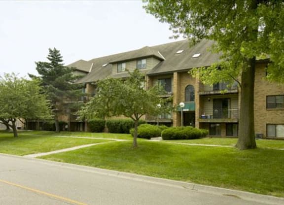 Side exterior with green space at Capitol View Apartments in Lincoln Nebraska