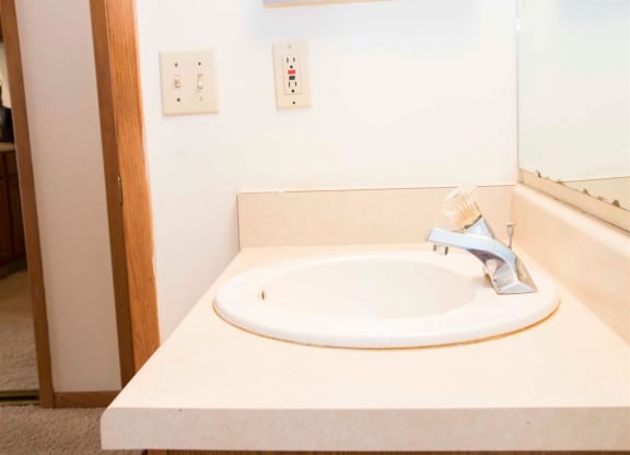 bathroom sink at Capitol View Apartments in Lincoln Nebraska