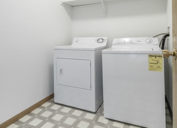 Full size washer and dryer and laundry room included at Northridge Heights Apartments