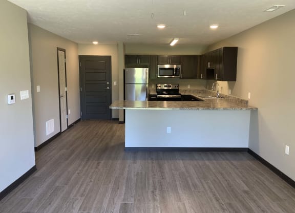 Open concent living room and kitchen at Northridge Heights in north Lincoln