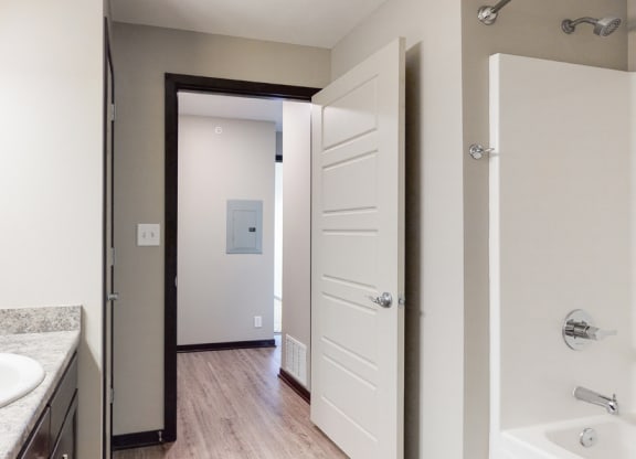 Renovated bathroom with linen storage closet at Northridge Heights Apartments
