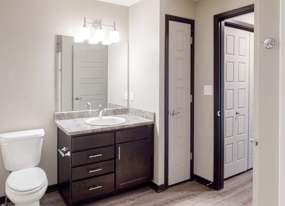 Renovated bathroom with linen storage closet at Northridge Heights Apartments