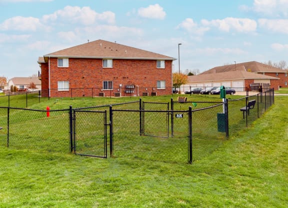 Large fenced dog park with grass at Northridge Heights apartments in Lincoln