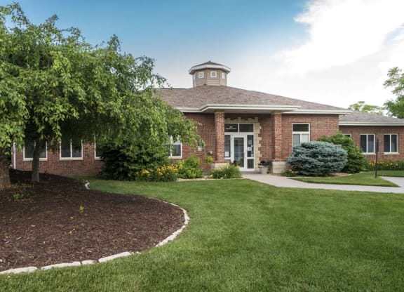 Exterior of clubhouse at Pinebrook Apartments