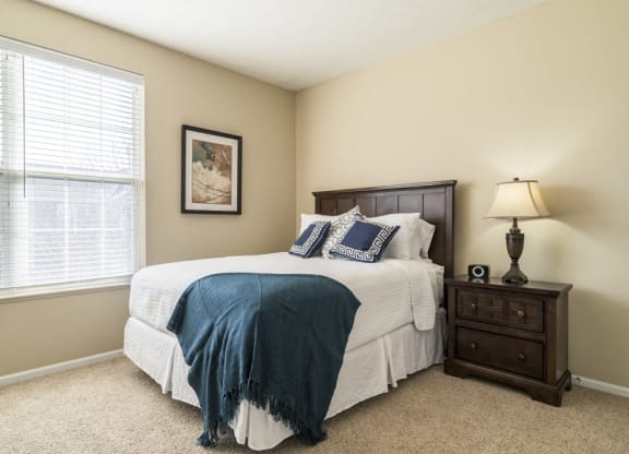 Interiors-Master bedroom with king-sized bed at Ridge Pointe Villas