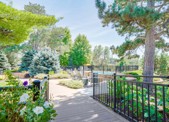 Walkway leading to the community fire pit and gated swimming pool