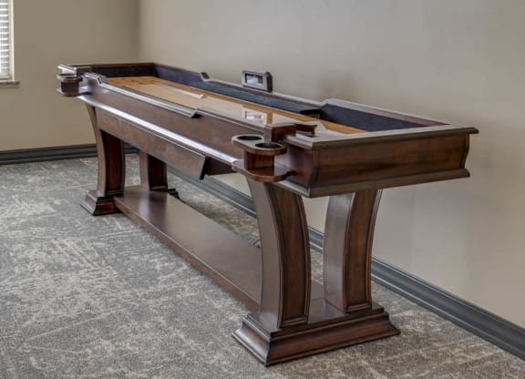 Shuffleboard table at Stone Creek Villas townhomes in west Omaha NE 68116