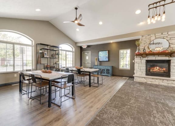 Tables and seating in clubhouse at Stone Creek Villas townhomes in west Omaha NE 68116