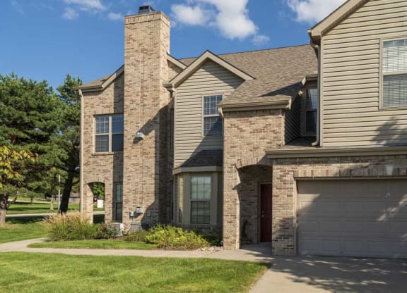 Private entrance with two-car attached garage at Stone Creek Villas townhomes in west Omaha NE 68116