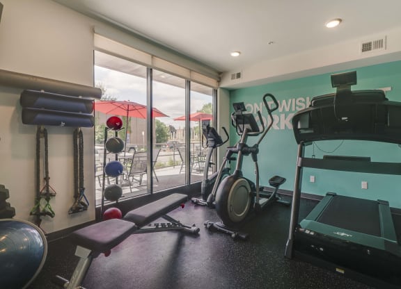 Workout gym with cardio equipment at The Central apartments near downtown Minneapolis MN 55408