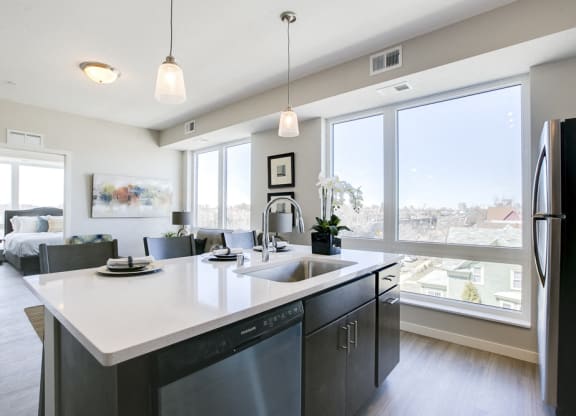 View of apartment from kitchen island at The Central apartments near downtown Minneapolis MN 55408