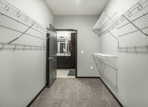 Spacious walk-in closet at The Conrad apartments in midtown Omaha NE
