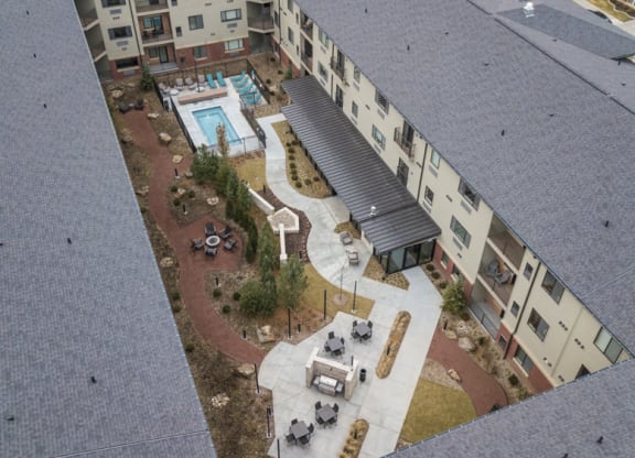 Courtyard with pool at The Conrad apartments in Blackstone District Omaha NE