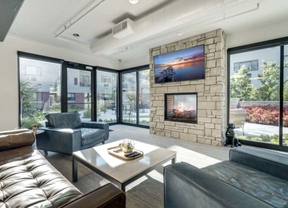 TV lounge with views of pocket park at The Conrad near UNMC in the Blackstone District Omaha NE 68105
