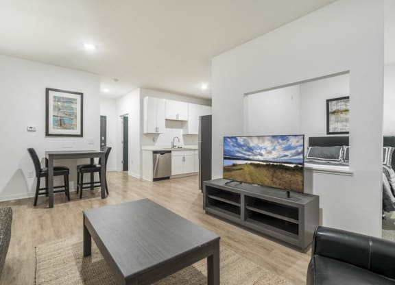 Living room of studio apartment for rent at The Conrad near UNMC in Omaha NE