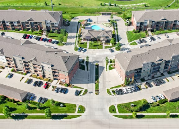 Arial view of the flats at 84 entrance with apartment buildings and swimming pool