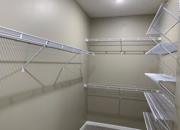 Walk in closet with plenty of shelving and hanging space