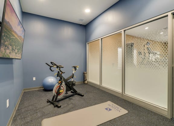 Private yoga and cycling studio at The Flats at Shadow Creek new luxury apartments in east Lincoln NE 68520