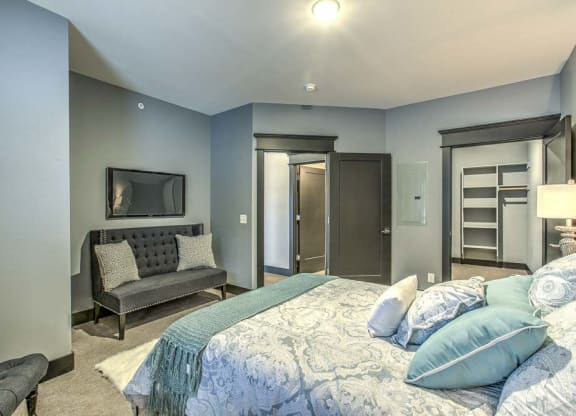 Large open floor plan bedroom with large walk in closet