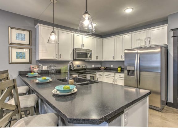 Counter top seating and view of the kitchen at The Helen