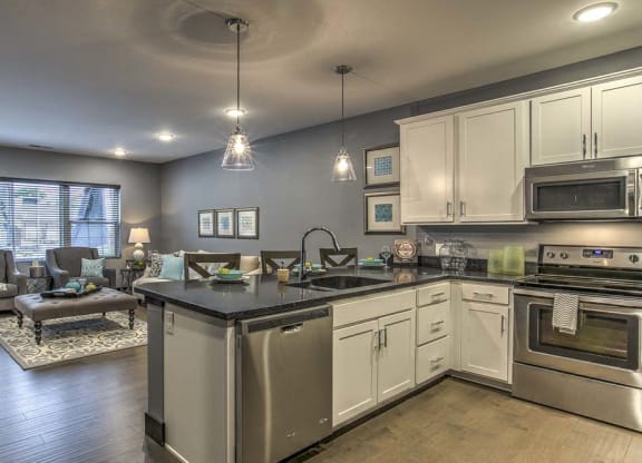 View of kitchen and living room from entrance at The Helen