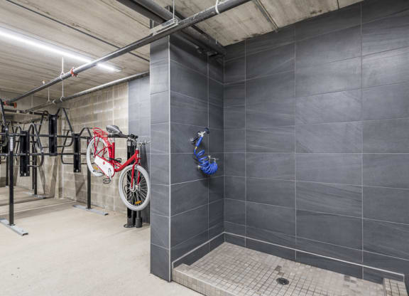Bike wash station next to bicycle storage at The Preserve at Normandale Lake
