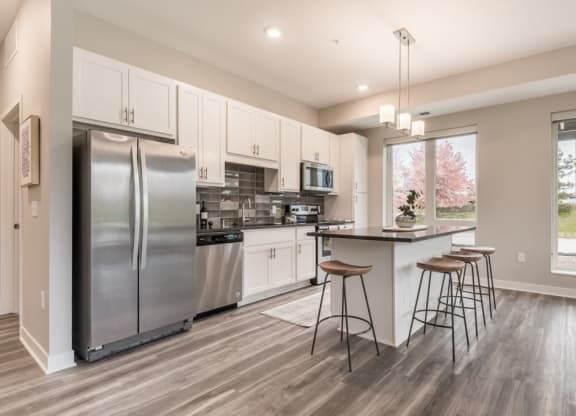 Interiors- Design A-White cabinets and dark countertops-The Preserve at Normandale Lake