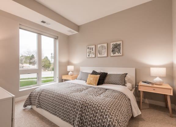Interiors- Bedroom with natural light at The Preserve at Normandale Lake