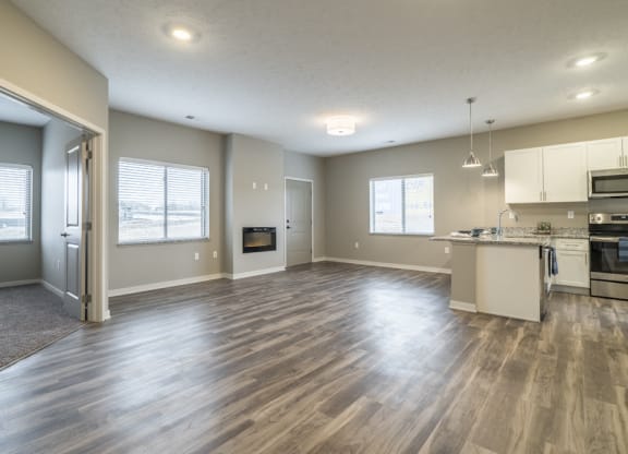 Interiors-2 bedroom apartment with living room and kitchen view at The Villas at Falling Waters