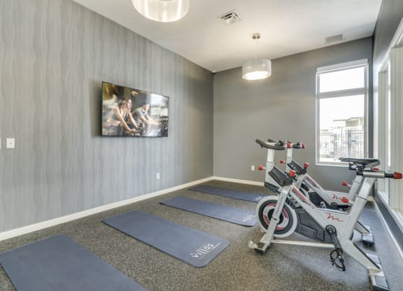 Yoga/spin studio at The Villas at Falling Waters luxury townhomes for rent in west Omaha NE