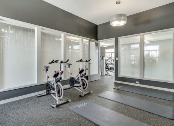 Yoga/spin studio at The Villas at Falling Waters luxury townhomes for rent in west Omaha NE