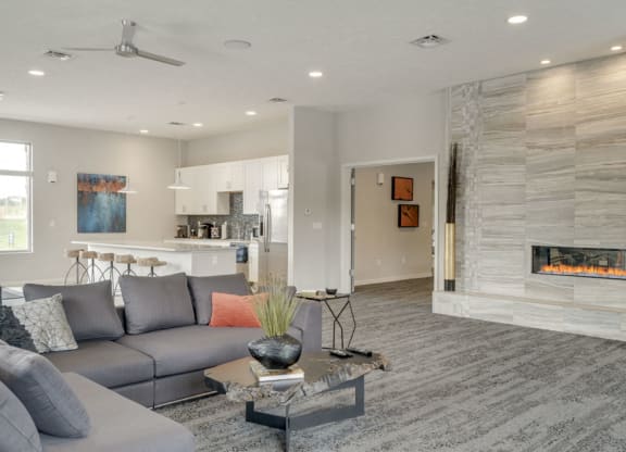 Resident clubhouse with TV lounge and fireplace at The Villas at Falling Waters in west Omaha NE