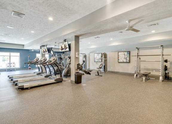 Large fitness center with a variety of equipment at The Villas at Mahoney Park