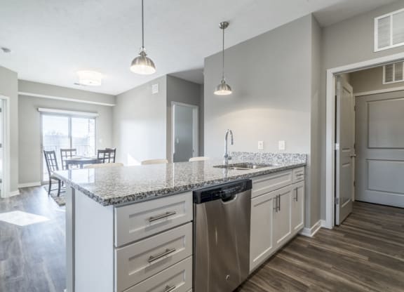 Kitchen with pendant lighting at The Villas at Mahoney Park