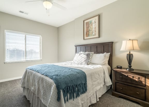 Spacious bedroom with lots of natural lighting at The Villas at Mahoney Park
