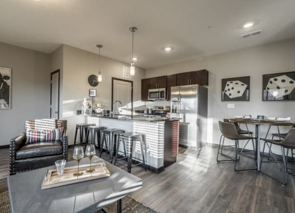 Open floor plan living room and kitchen at The Villas at Mahoney Park