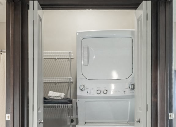 Stackable or full size washer and dryer included in unit at The Villa at Mahoney Park