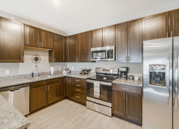 Spacious kitchens with granite countertops at WH Flats new luxury apartments in south Lincoln NE 68516