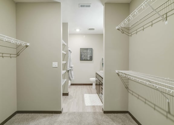 Walk in closet in master bedroom at WH Flats new luxury apartments in south Lincoln NE 68516