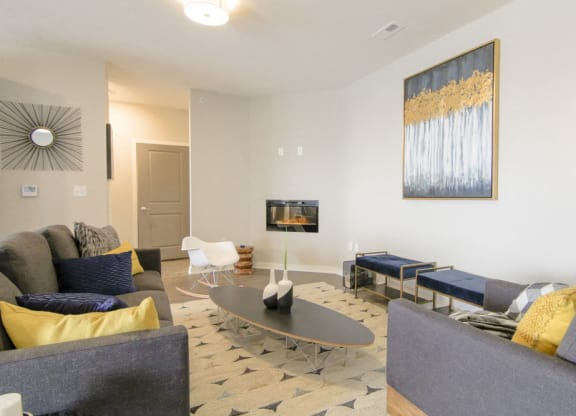 Living room with modern fireplace at WH Flats new luxury apartments in south Lincoln NE 68516
