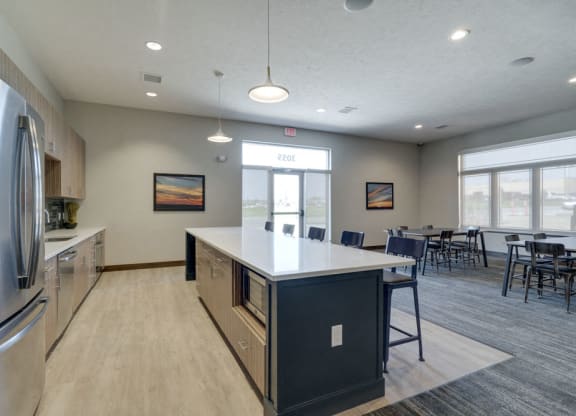 Resident clubhouse with kitchen and seating