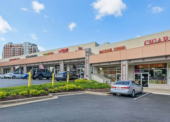 A cigarette store is located in a strip mall.