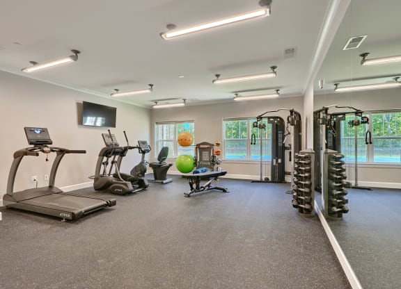 fitness center with exercise equipment