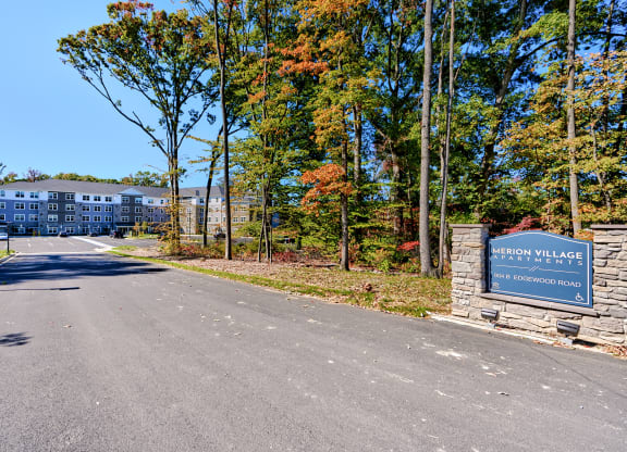 a view of the entrance apartments from the road